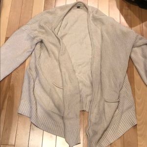 Knitted long cardigan. Covers the bum!